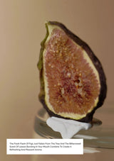 Halved fig on a stand with a beige background
