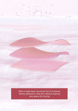 Pink adhesive patches on a textured white background with text about moisture and adhesion.