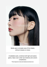 Woman with smooth skin and even makeup on a white background