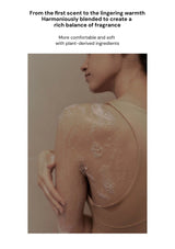 Person with a smooth, moisturized shoulder and arm, with text about fragrance and plant-derived ingredients.