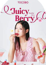 Woman eating a berry with 'Tocobo Juicy Berry' branding in the background