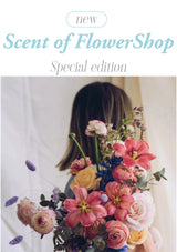 Person holding a bouquet of flowers with 'Scent of FlowerShop' text overlay