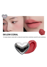 Lipstick with a heart-shaped cap on a white background, featuring color swatch and product name.