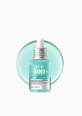 Skincare serum bottle with dropper labeled 'Anua 100+' on a light green background