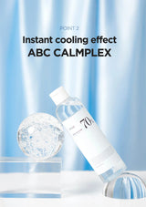 Bottle of ABC Calmplex with a cooling effect on a blue background