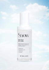 Skincare bottle labeled 'Snow' on a light blue gradient background