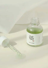 Skincare bottle with dropper on a white background