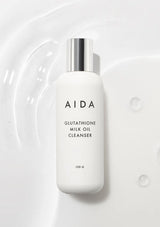 AIDA Glutathione Milk Oil Cleanser bottle on a white background