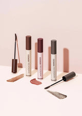 Cosmetik makeup products on a light pink background