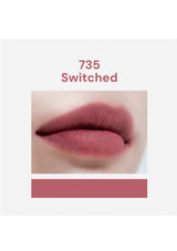 Lipstick shade 735 'Switched' applied on a lip with a white background