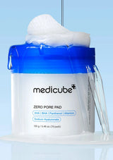 Medicube Zero Pore Pad packaging with blue lid and white foam on a light blue background