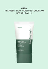 Anua Heartleaf Silky Moisture Suncream with Green Background