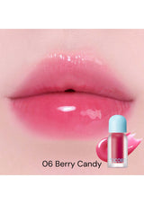 Lip gloss labeled '06 Berry Candy' applied on lips with a close-up of the product.