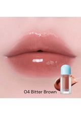 Lip gloss labeled '04 Bitter Brown' applied to lips with a bottle of gloss visible.