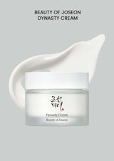 Beauty of Joseon Dynasty Cream jar with a white cream smear on a gray background