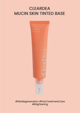 Cleardea Mucin Skin Tinted Base tube on a pink background