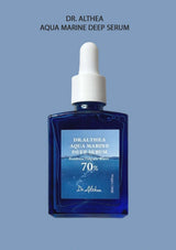 Blue serum bottle with dropper labeled 'Dr. Althea Aqua Marine Deep Serum' on a blue background
