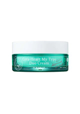 Green jar of Cera-Heart My Type Duo Cream on a white background