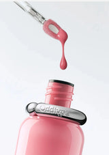 Pink nail polish bottle with applicator and 'Oddity' branding on a white background