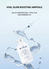 AIDA hyal glow boosting ampoule with dropper on a light blue background