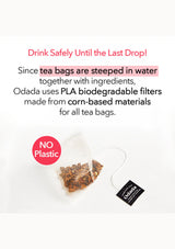 Tea bag with Odada label and biodegradable filter on a white background