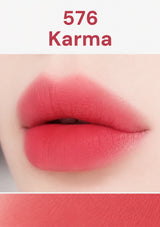 Lipstick shade 576 Karma shown on a lip with a close-up and swatch.