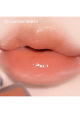 An image showcasing the Alternative Stereo Lip Potion Aqua Glow in 9 different shades, with bottles arranged in two rows. The shades range from pink to red and purple, representing the available color variations of the product.