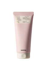 Pink tube of whipped product with a label on a white background