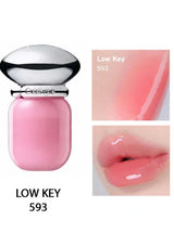 Pink lip gloss with a silver cap, shown in a bottle and on lips, on a white background.