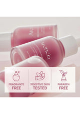 Two pink bottles with 'Avencia' branding on a light background, featuring icons for fragrance-free, sensitive skin tested, and paraben-free.