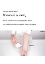 Person holding a small white device with text about its waterproofing properties on a white background.