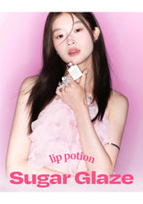 Woman holding a lip potion labeled 'Sugar Glaze' against a pink background