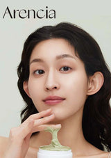 Woman holding a green facial product with 'Arencia' branding