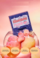 Blanc dubu Peach breath freshener packaging on a pink background
