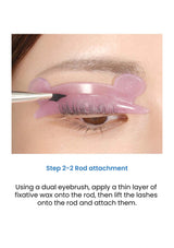Eyelash extension application with a dual eyebrush and pink rod attachment.