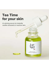 Skincare serum bottle with dropper on a light background