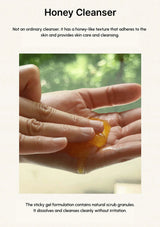 Honey Cleanser being applied to hands with a natural background
