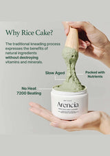 Arenica cleanser with green rice cake on top, held by a hand against a gray background.