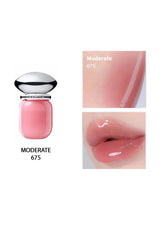 Pink lip gloss with packaging and application on lips