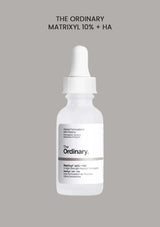 The Ordinary Matrixyl 10% + HA skincare serum bottle on a gray background