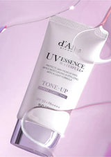 Skincare product with 'd'Amba' branding on a pink background