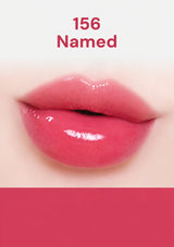 Close-up of pink lips with gloss, labeled '156 Named' on a white background.