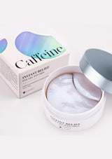 Packaging of K-Secret Instant Relief Eye Gel Patches with Caffeine. The box is predominantly white with a picture of the blue and pink gel patches used for the eyes, and text detailing the product name and key ingredient, Caffeine.