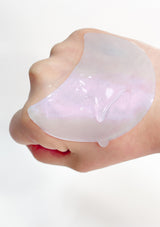 Packaging of K-Secret Instant Relief Eye Gel Patches with Caffeine. The box is predominantly white with a picture of the blue and pink gel patches used for the eyes, and text detailing the product name and key ingredient, Caffeine.