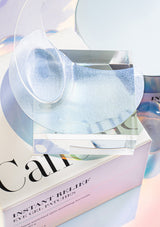 Packaging of K-Secret Instant Relief Eye Gel Patches with Caffeine. The box is predominantly white with a picture of the blue and pink gel patches used for the eyes, and text detailing the product name and key ingredient, Caffeine.