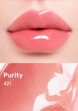 Lipstick with a close-up of lips wearing it, labeled 'Purity 421' on a pink background.