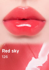 Close-up of lips with red lipstick labeled 'Red sky 126' on a pink background