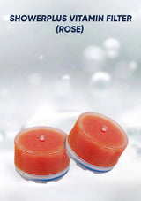 Showerplus Vitamin Filter in rose color on a light gray background