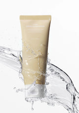 Skincare mask tube with water splash on a white background