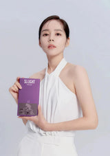 Woman holding a purple book titled 'Slight' against a light gray background